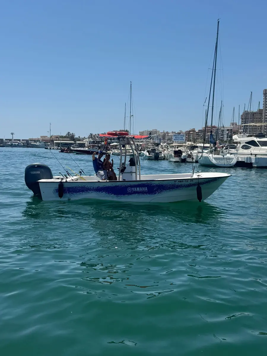 Fishing Trips Marbella boat with its Yamaha engine at Marina La Bajadilla, Marbella